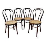 4 antique curved wood and cane chairs