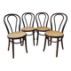4 antique curved wood and cane chairs