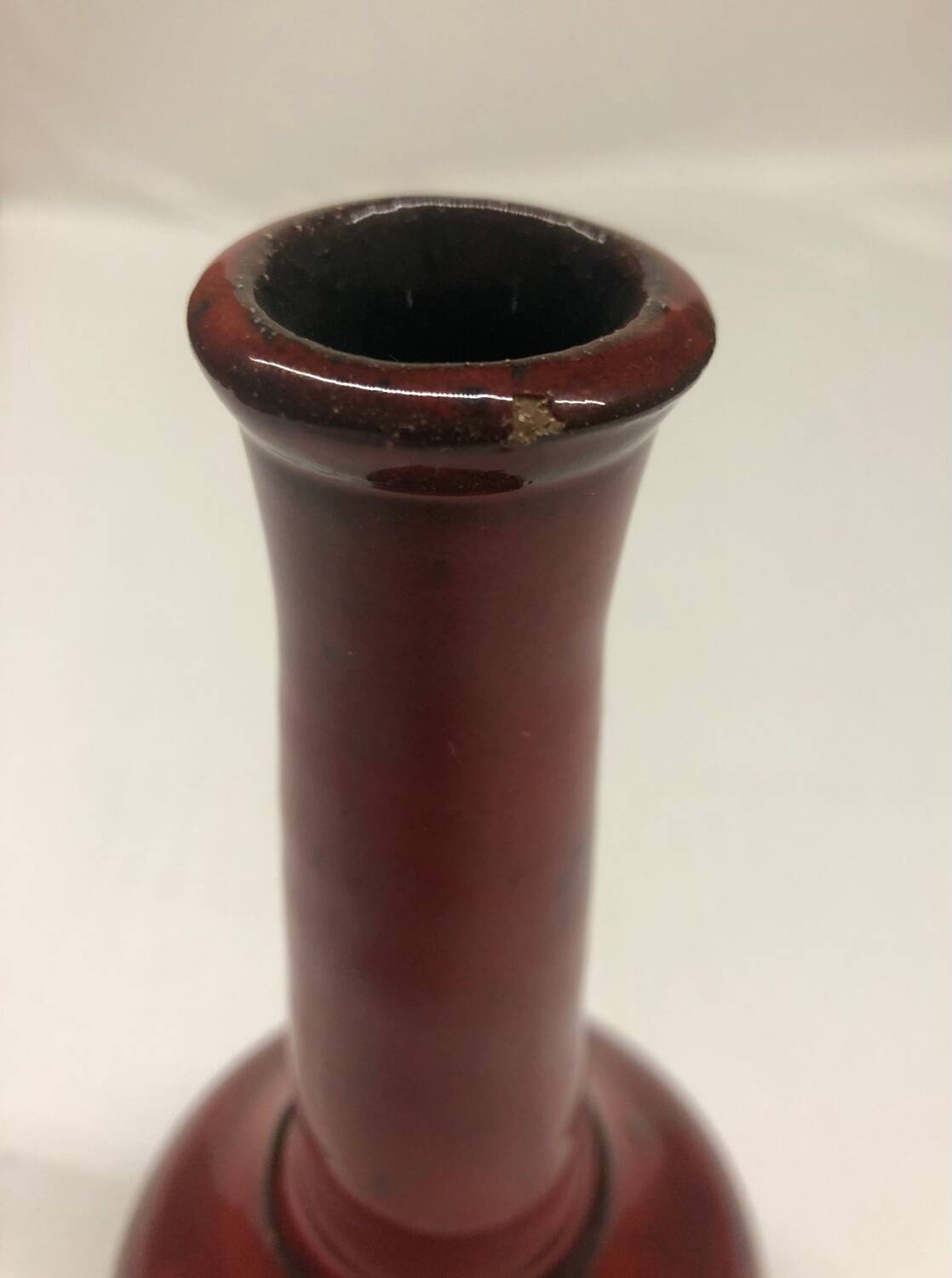 Red ceramic bud vase