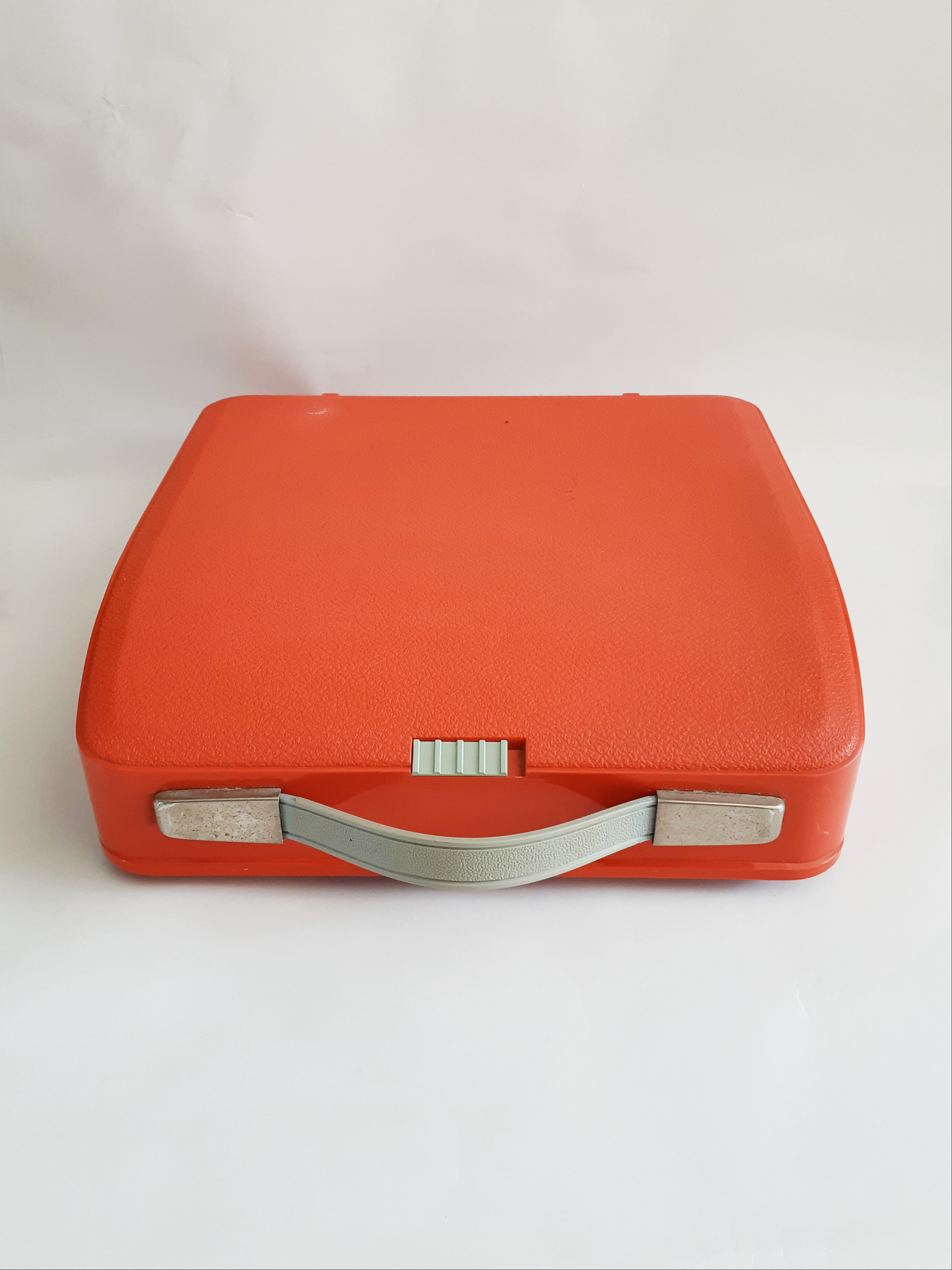 Hermes Baby orange typewriter, portable, functional