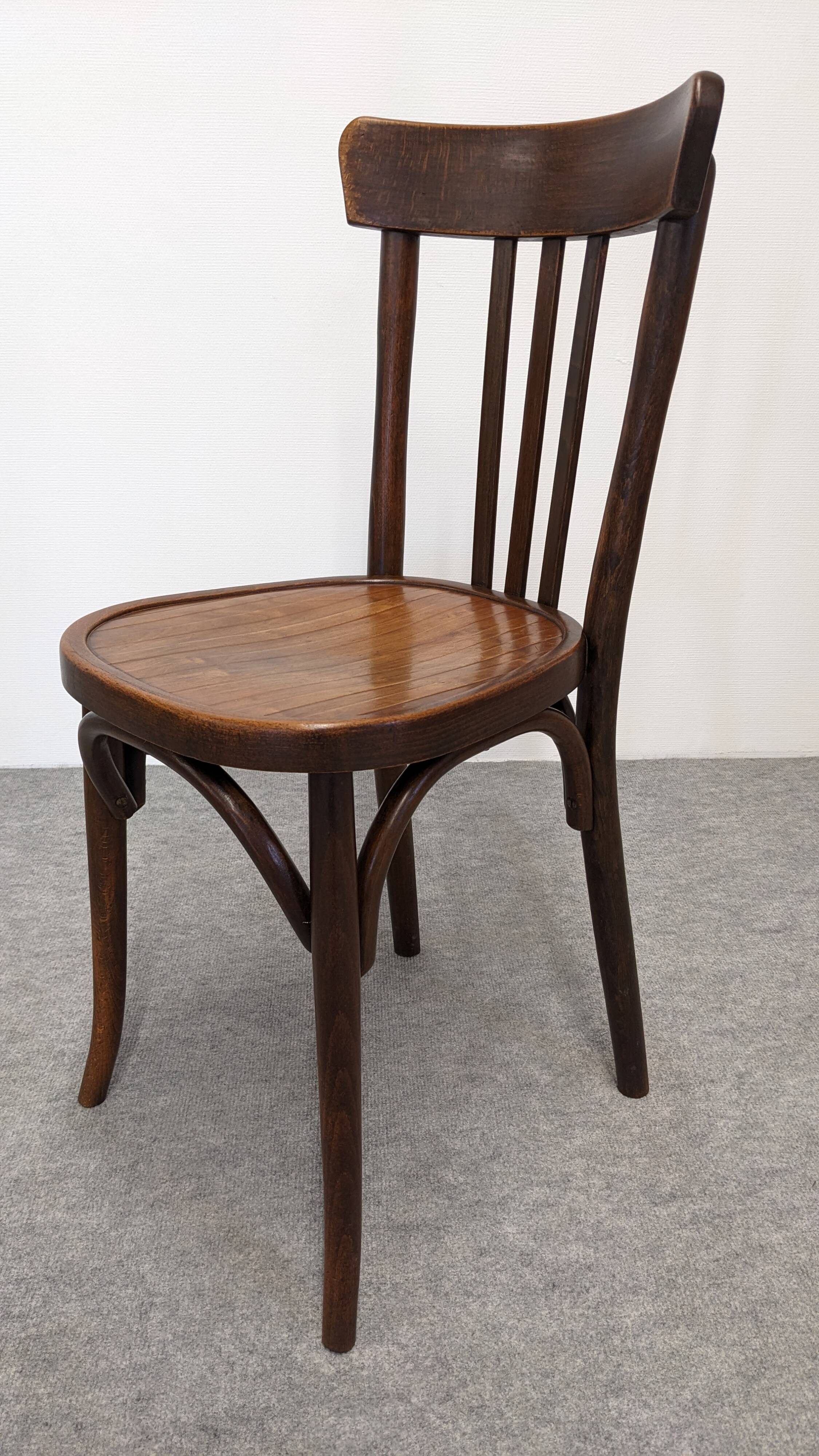 Set of 8 Baumann bistro chairs in bent beech, France circa 1930.