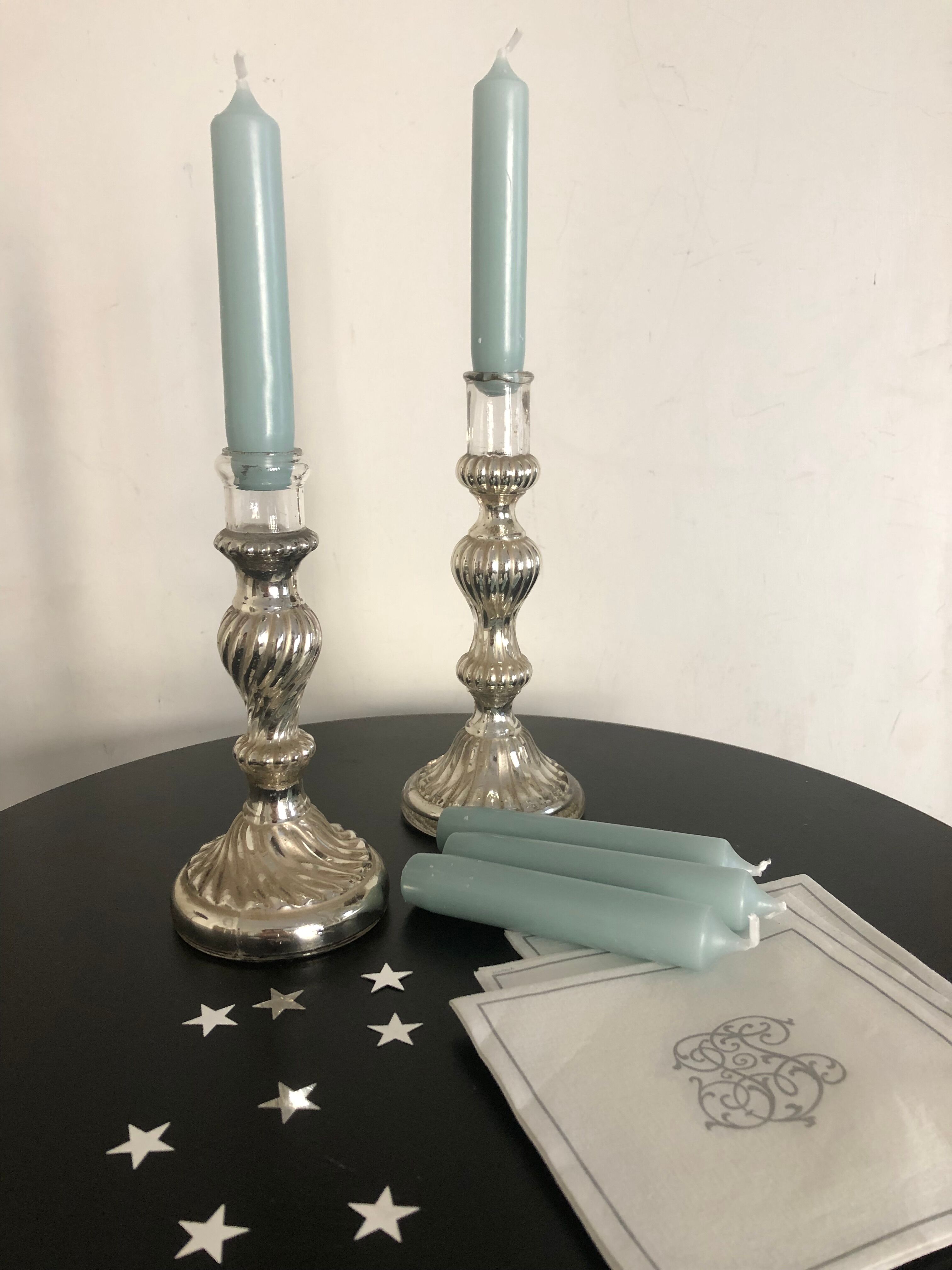 Pair of mercerized candle holders