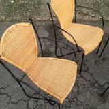 4 vintage wrought iron rattan chairs.