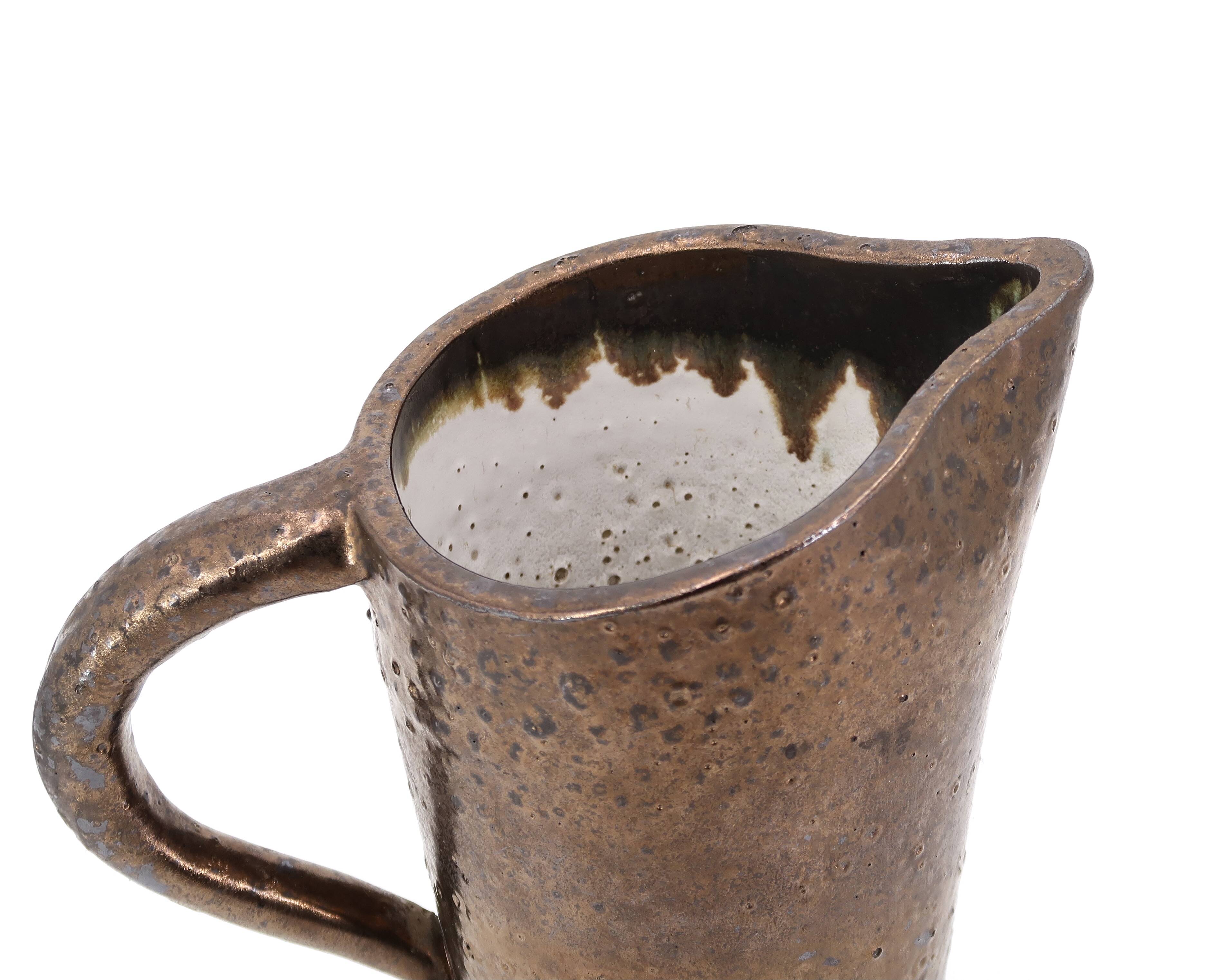 Golden ceramic pitcher, 1950s