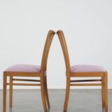 Set of 8 vintage Danish design dining chairs from the 1970s with light purple fabric seats