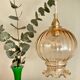 Vintage amber glass globe pendant light
