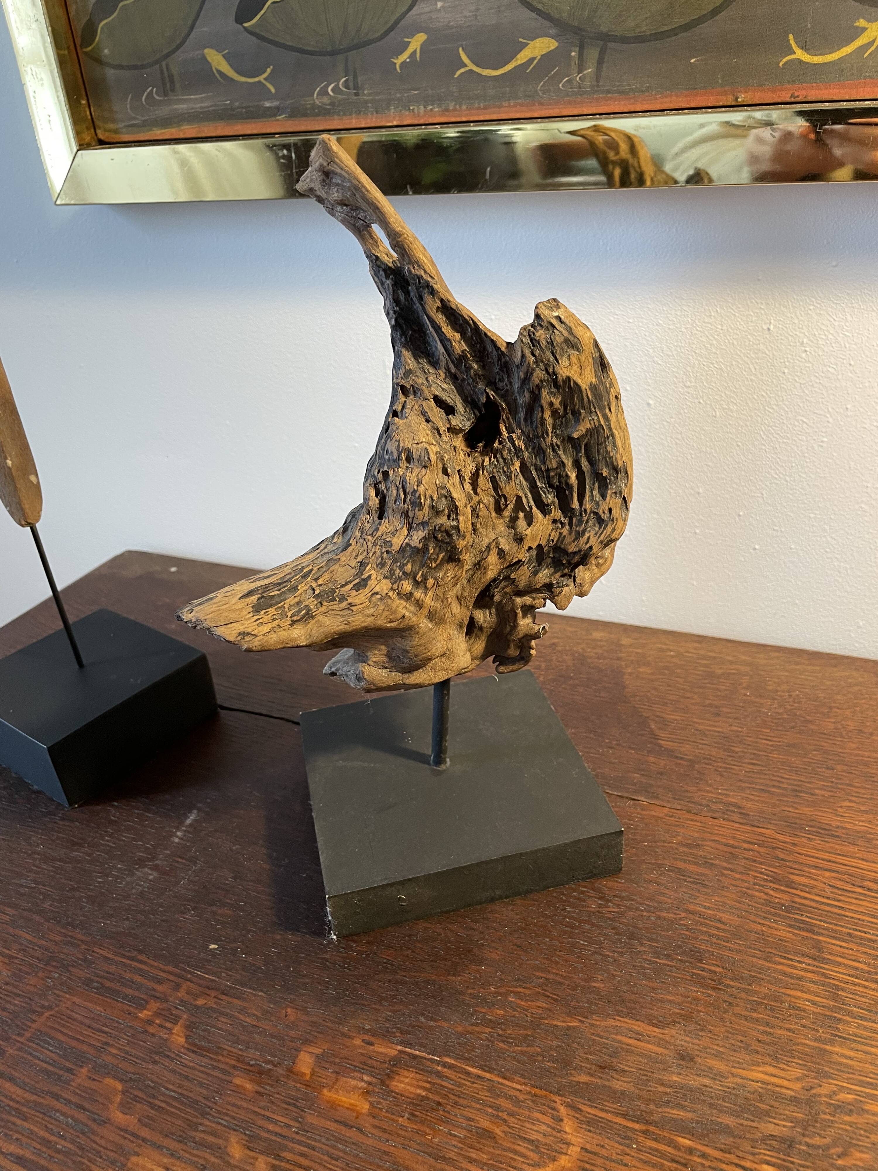 Set of 2 wooden sculptures on base