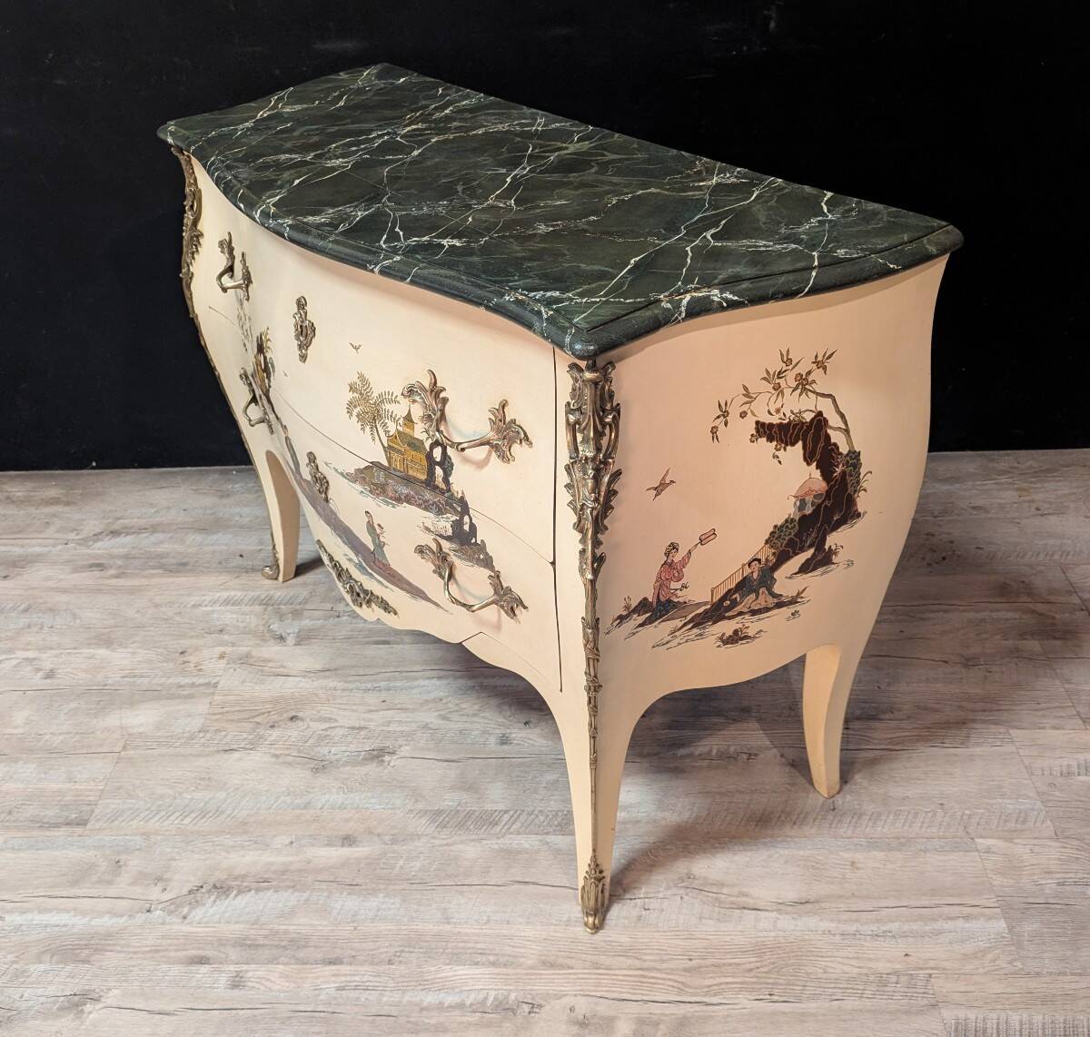 Curved Louis XV style commode with chinoiserie decoration.