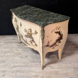 Curved Louis XV style commode with chinoiserie decoration.