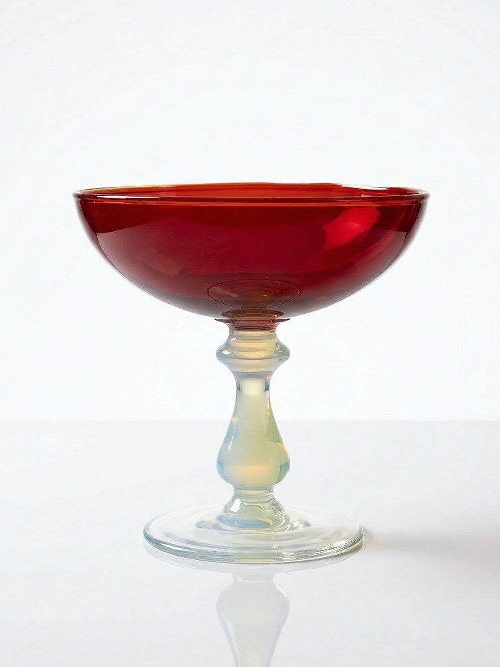 Red Venetian blown glass coupe on a foot with opaline and vintage soap bubble.