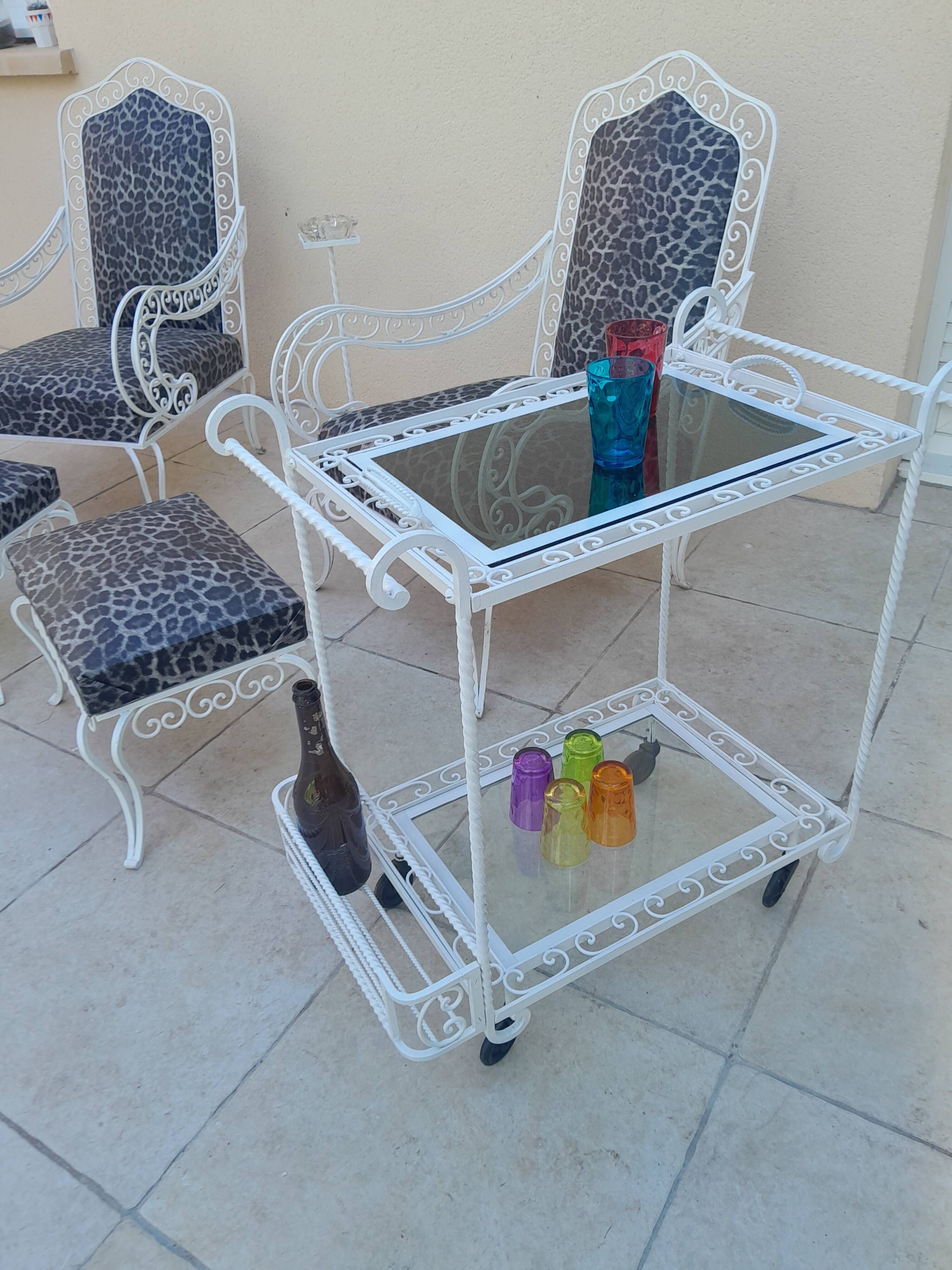 Pair of ottoman armchairs with wrought iron serving trolley, vintage garden, old design