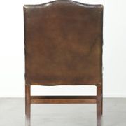 Wooden cow leather English Gainsborough chair with a stunning appearance