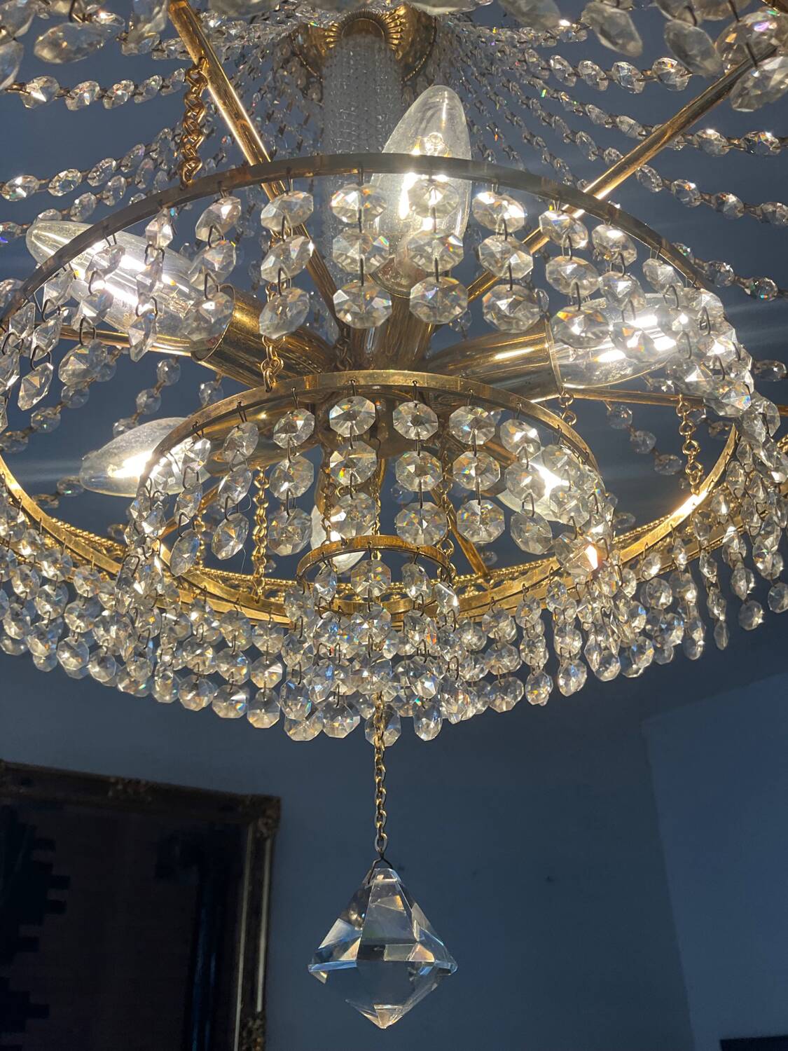 Brass hot air balloon chandelier with cascade of tassels