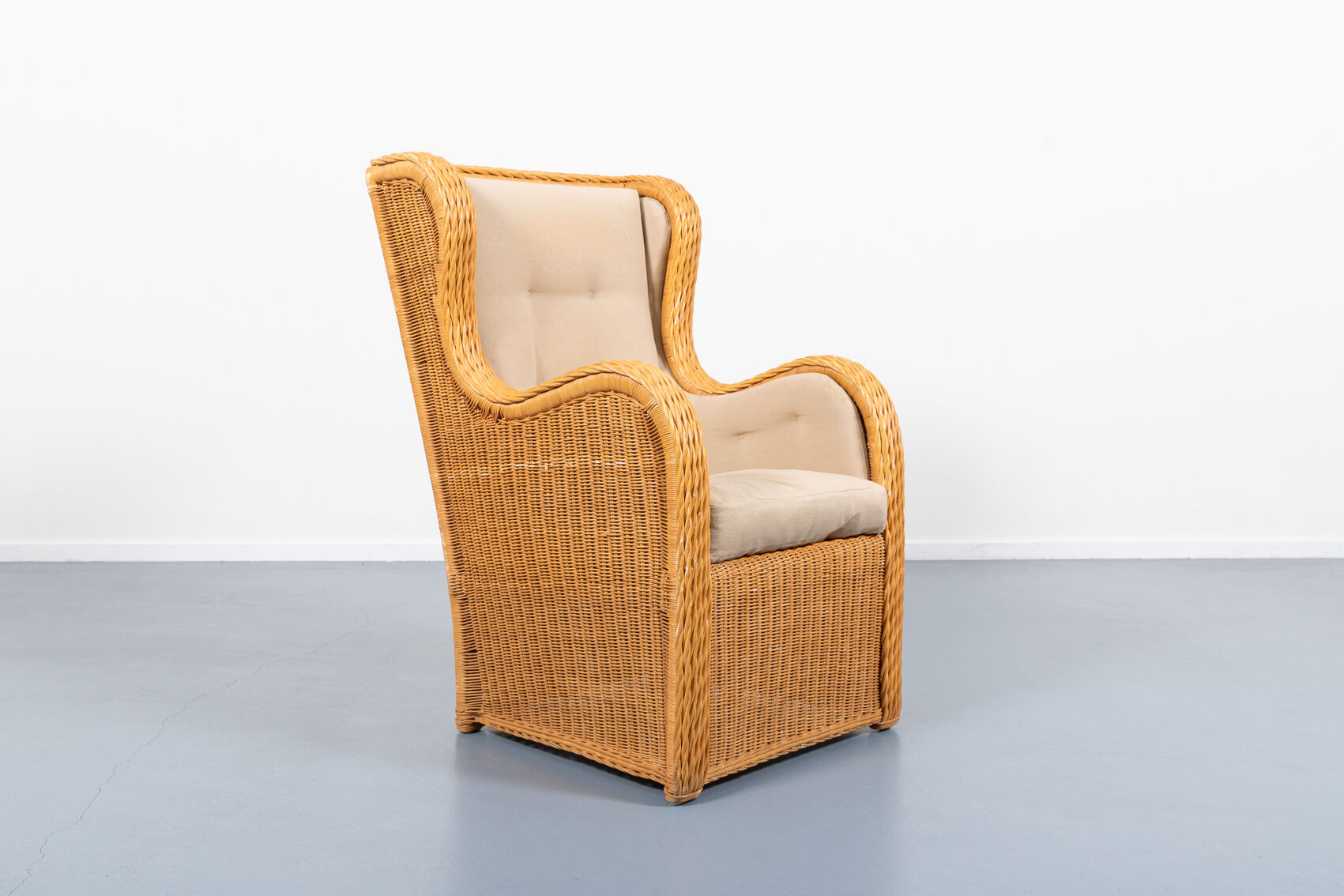 Vintage lounge armchair in wicker Italian design