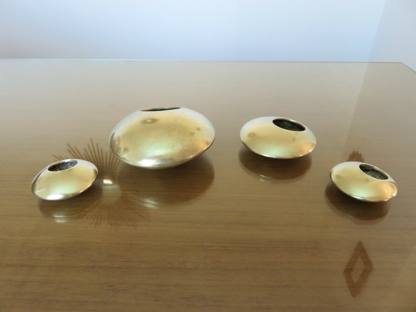Series of 4 Scandinavian "pebble" ashtrays in bronze 70s