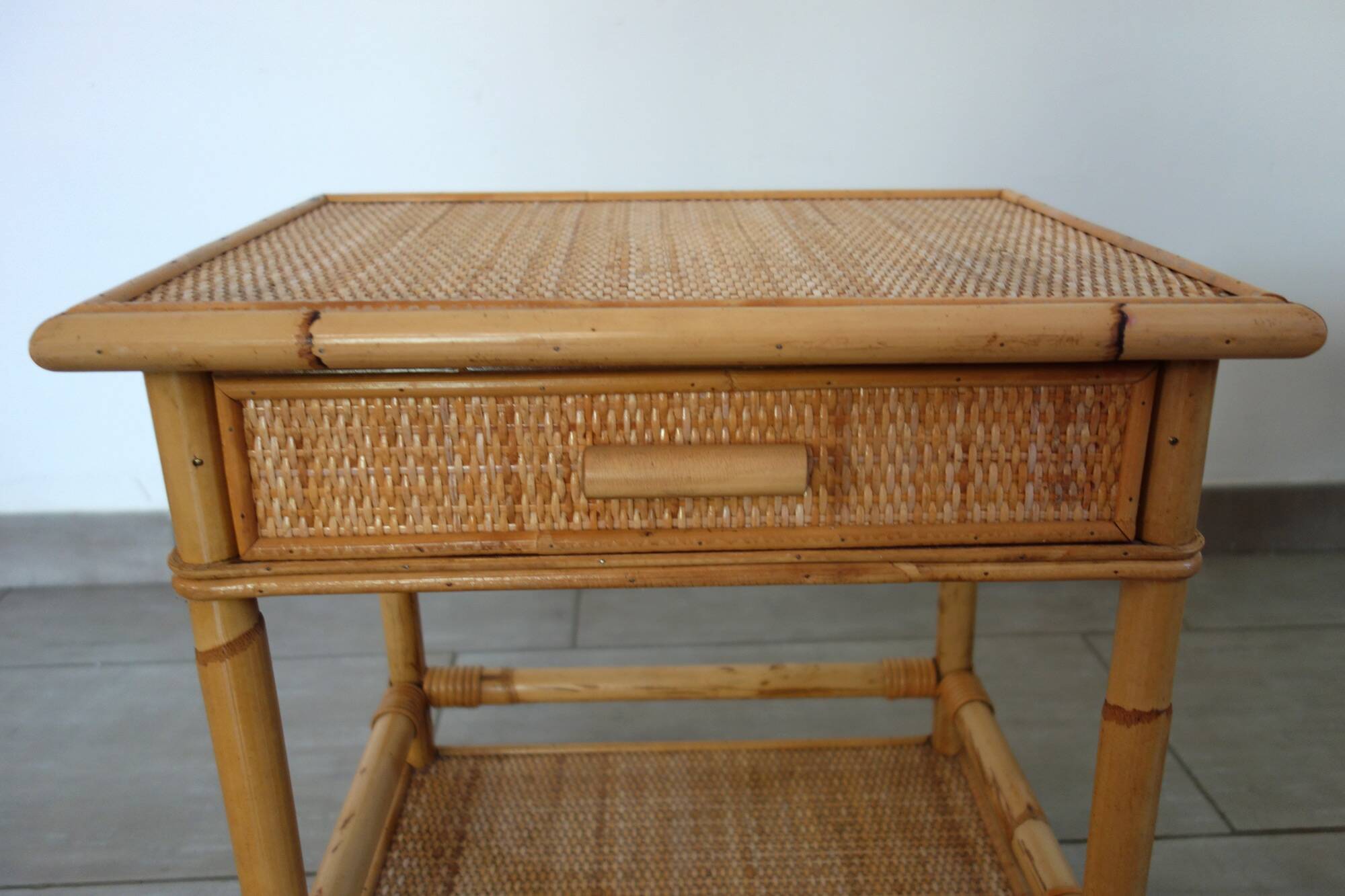 Pair of woven wicker and bamboo bedside tables, 70s/80s.