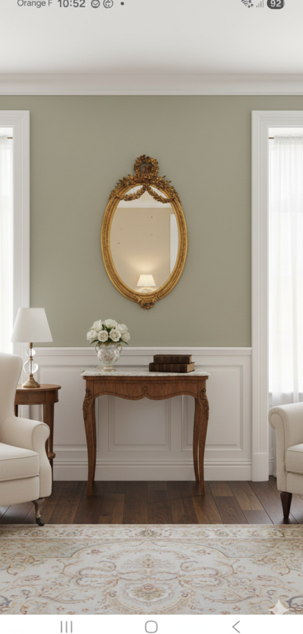Miroir ovale style Louis XVI En bois et stuc doré