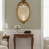 Oval mirror in Louis XVI style in wood and gilded stucco.