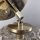 Gold tilting wall light