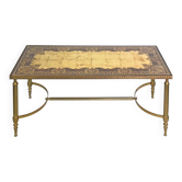 Coffee table in gilded brass with a mirrored eglomisé glass top.