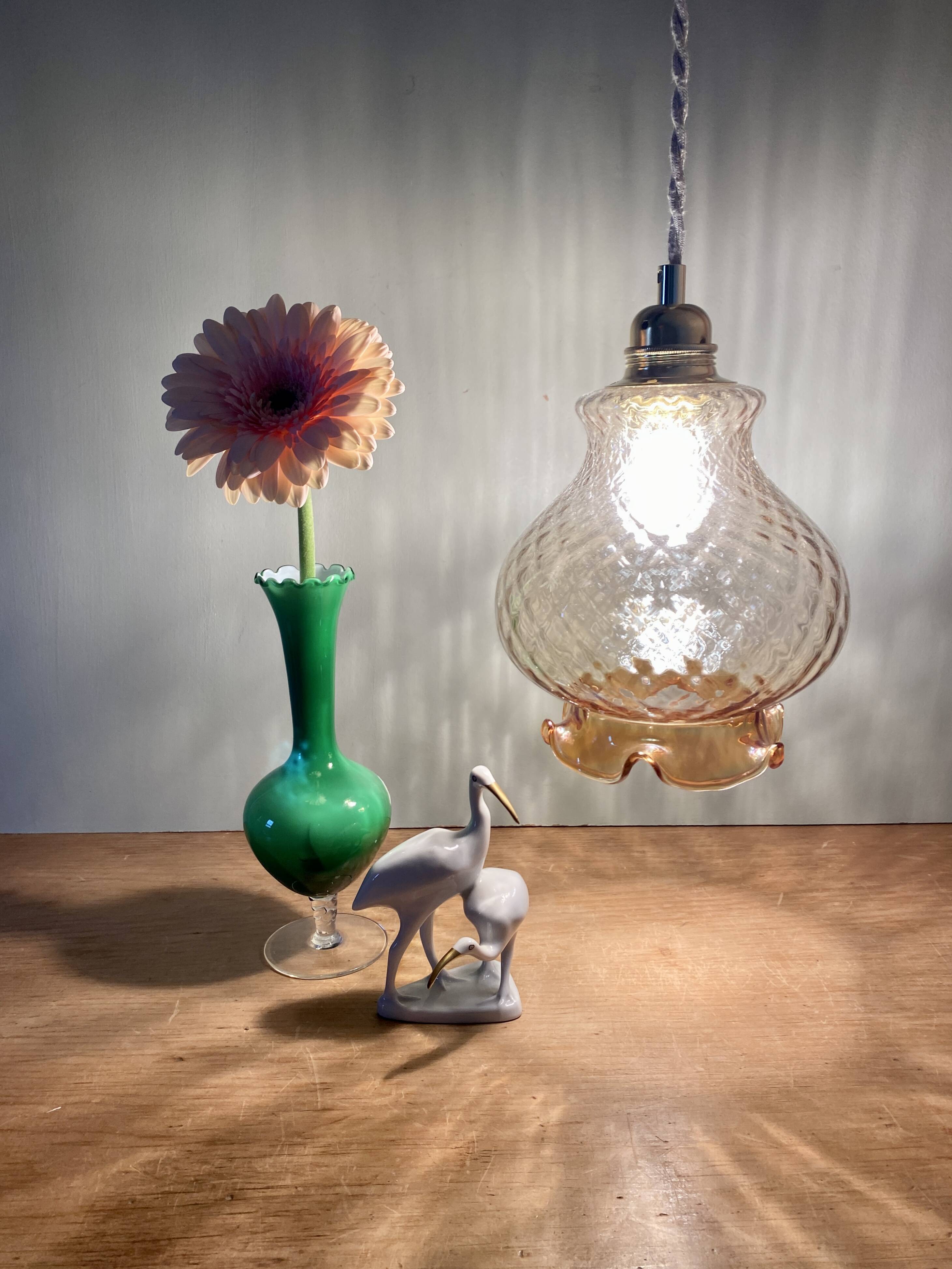 Vintage globe pendant light in amber glass