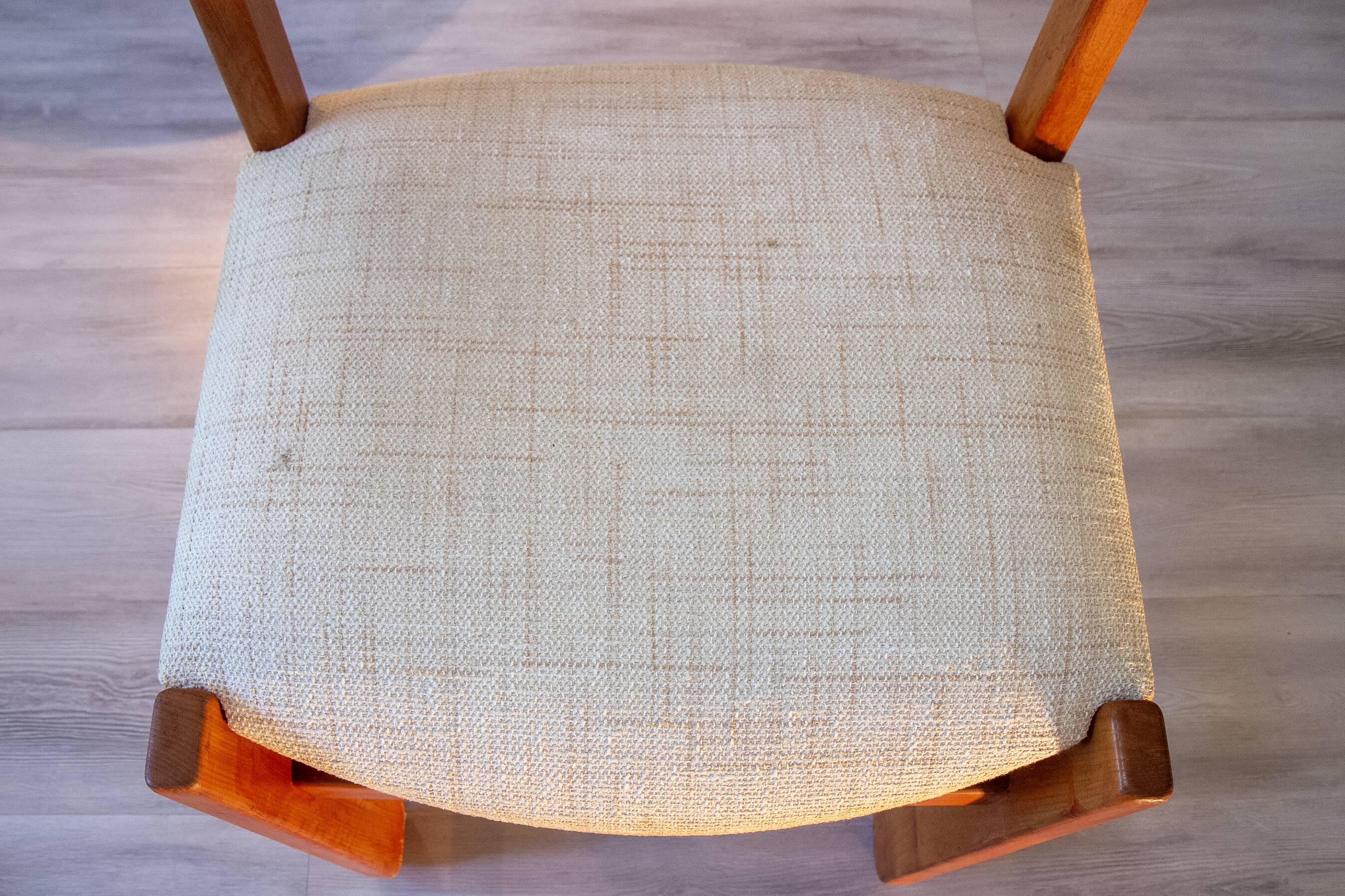 Chair in elm and wool, 1980s.