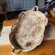 Braided basket in natural fiber, free form, vintage