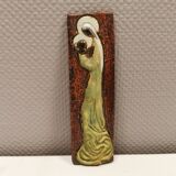 Slim relief with a motif of Madonna and child.