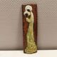 Slim relief with a motif of Madonna and child.