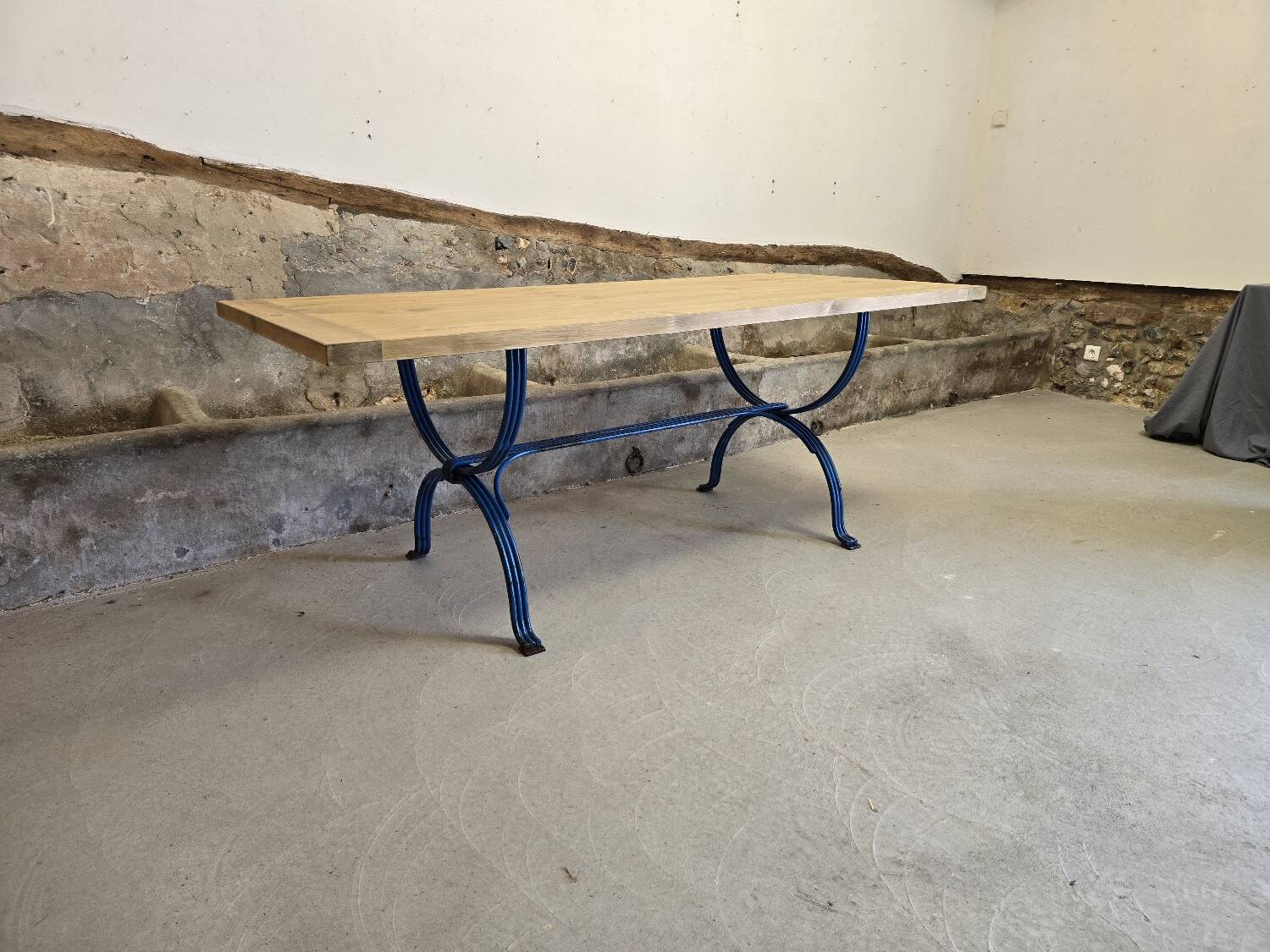 Wrought iron and solid wood table