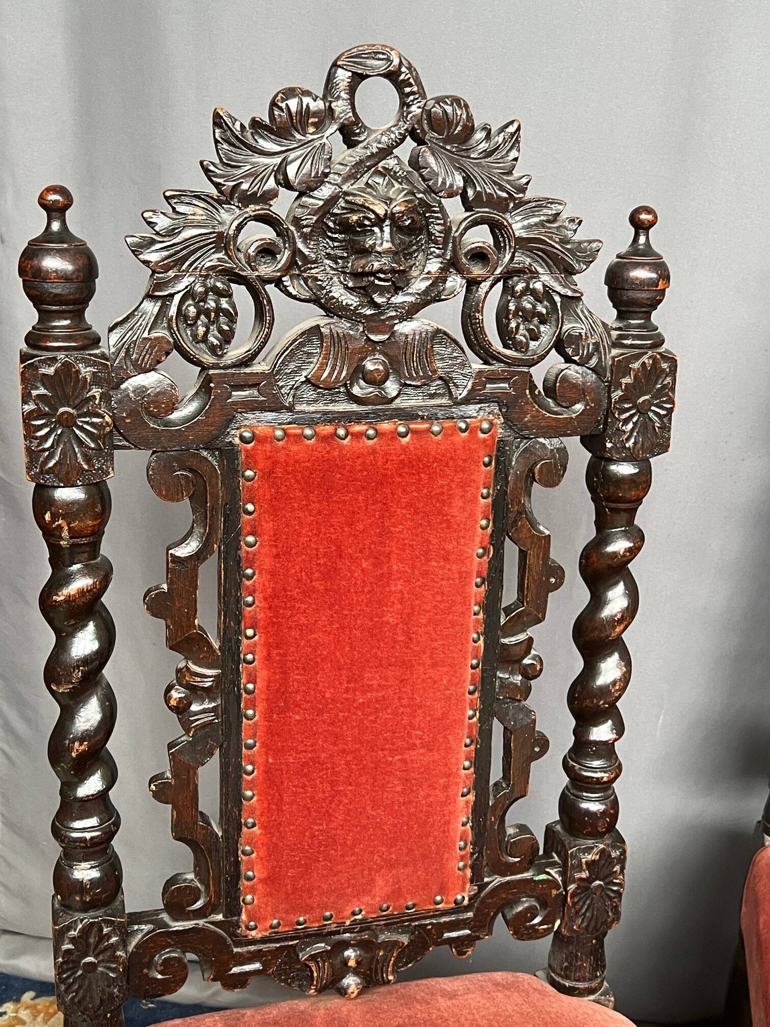 Set of 4 antique Renaissance-style oak chairs.