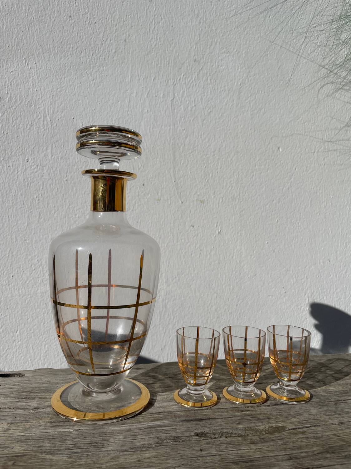 Art Deco glass and gold carafe or vase from the 1950s.