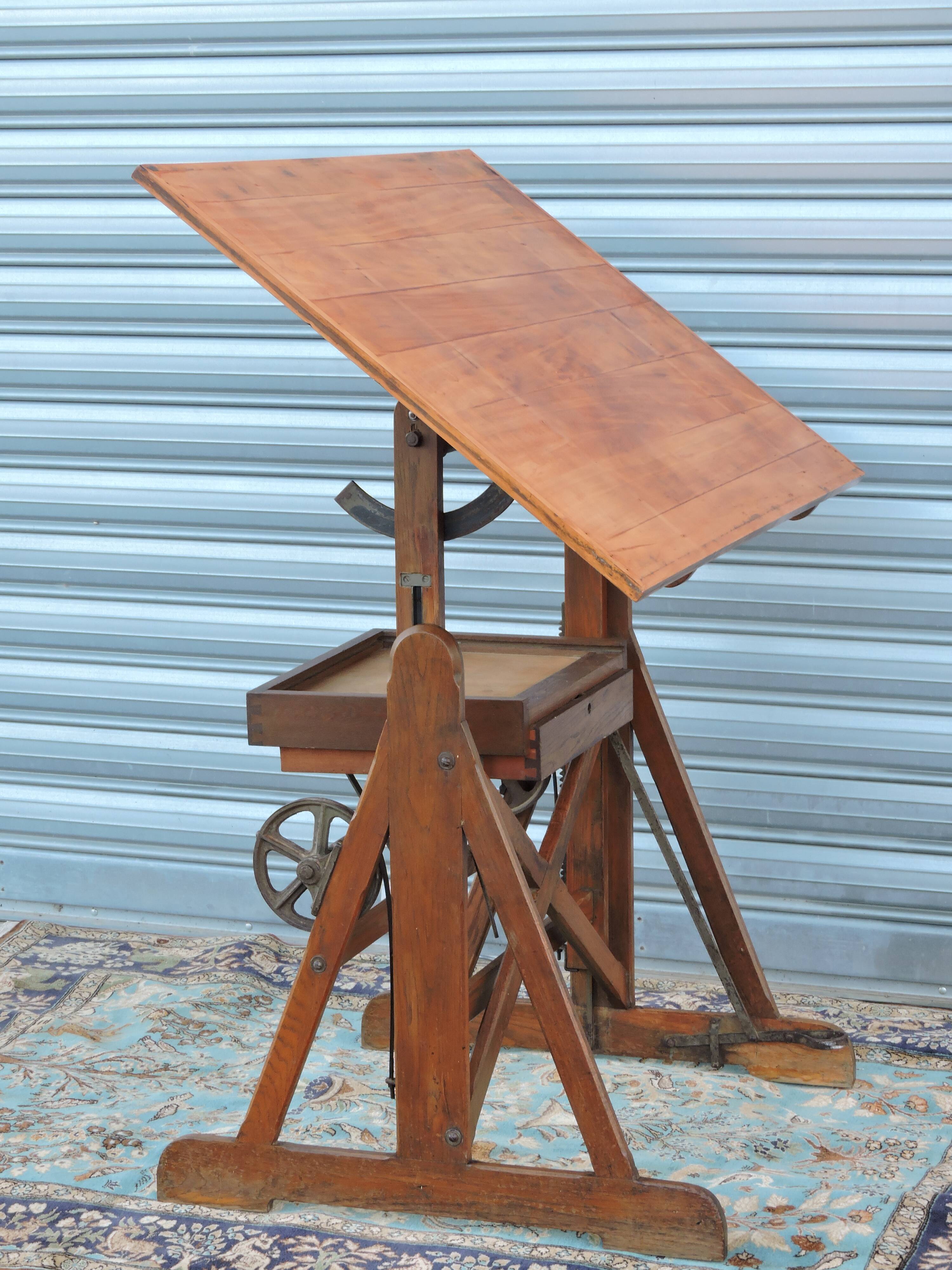 Architect's table has industrial adjustable design H Morin betting