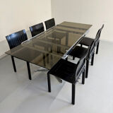 Smoked glass dining table with chrome legs, 1970s design by Roche Bobois.