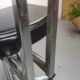 Chaise de bureau industrielle vintage à roulette skaï noir et chrome