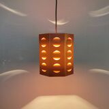 Danish Space-Age hanging lamp from the 80s, made in orange metal with cut-outs.