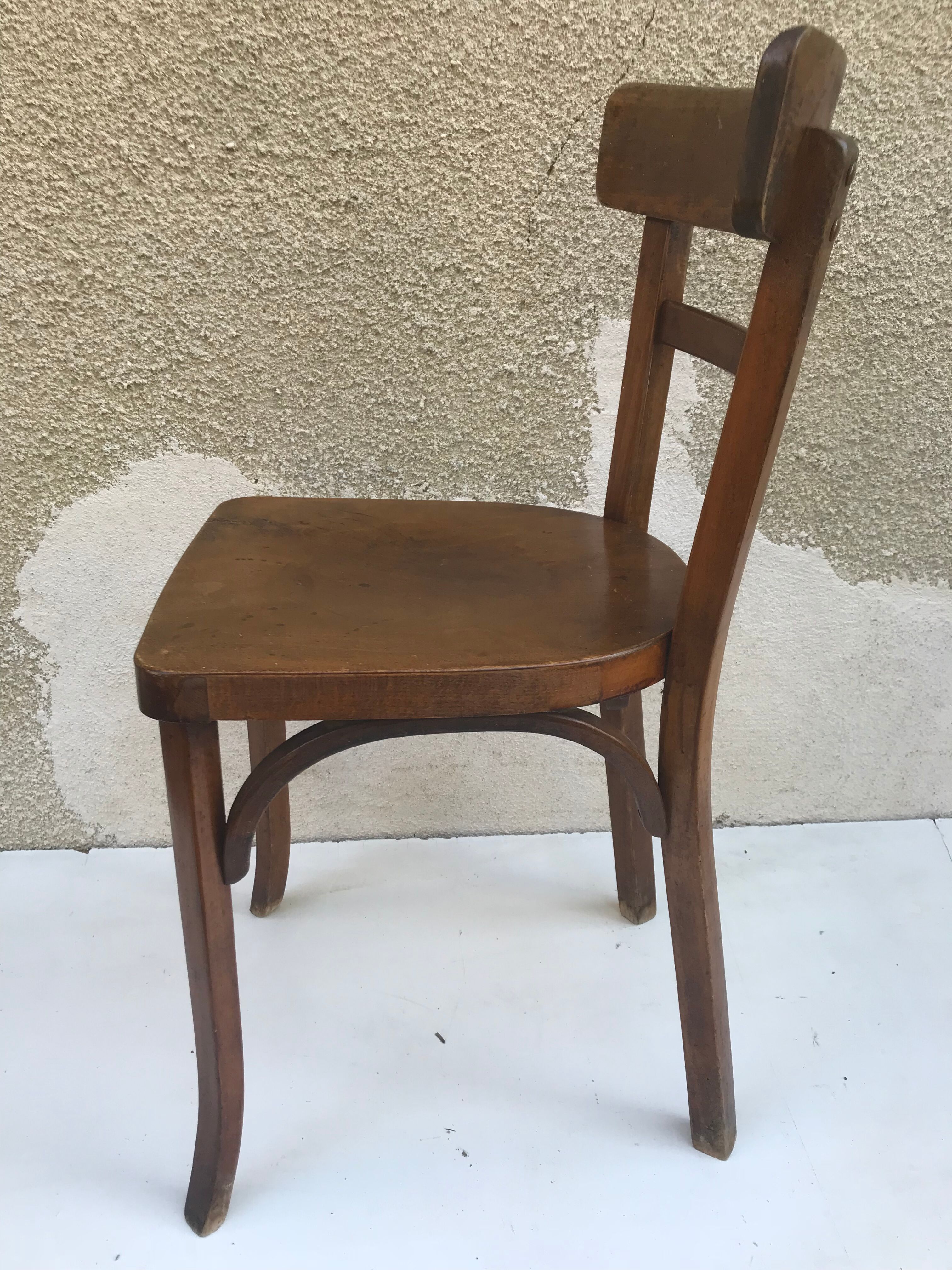 Serie de 4 chaises anciennes bistrot Baumann années 60