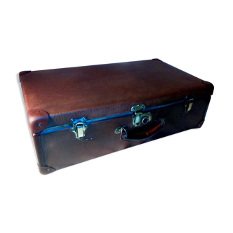 Old vintage black and white cardboard storage suitcase travel