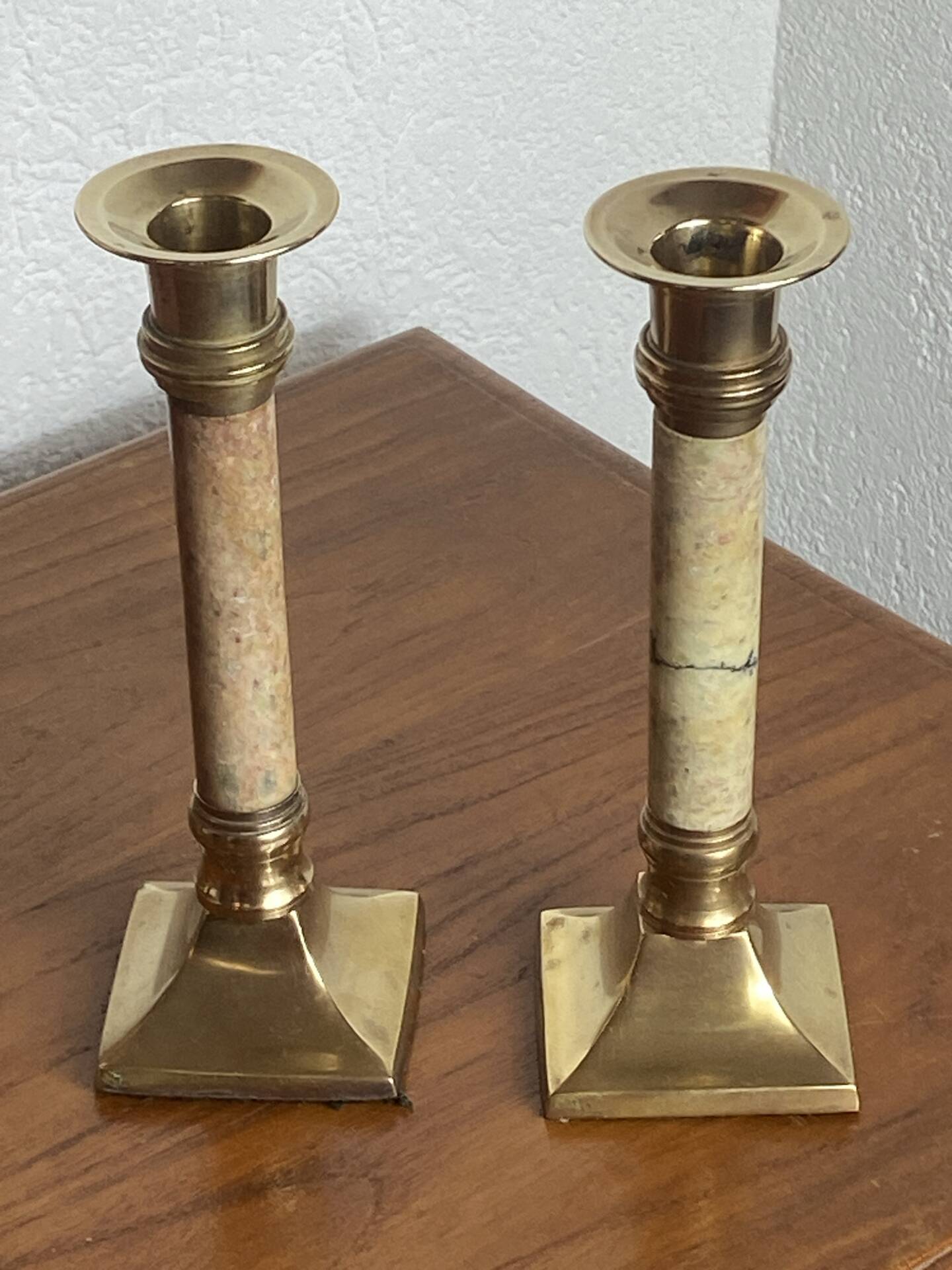 Pair of brass and stone candlesticks