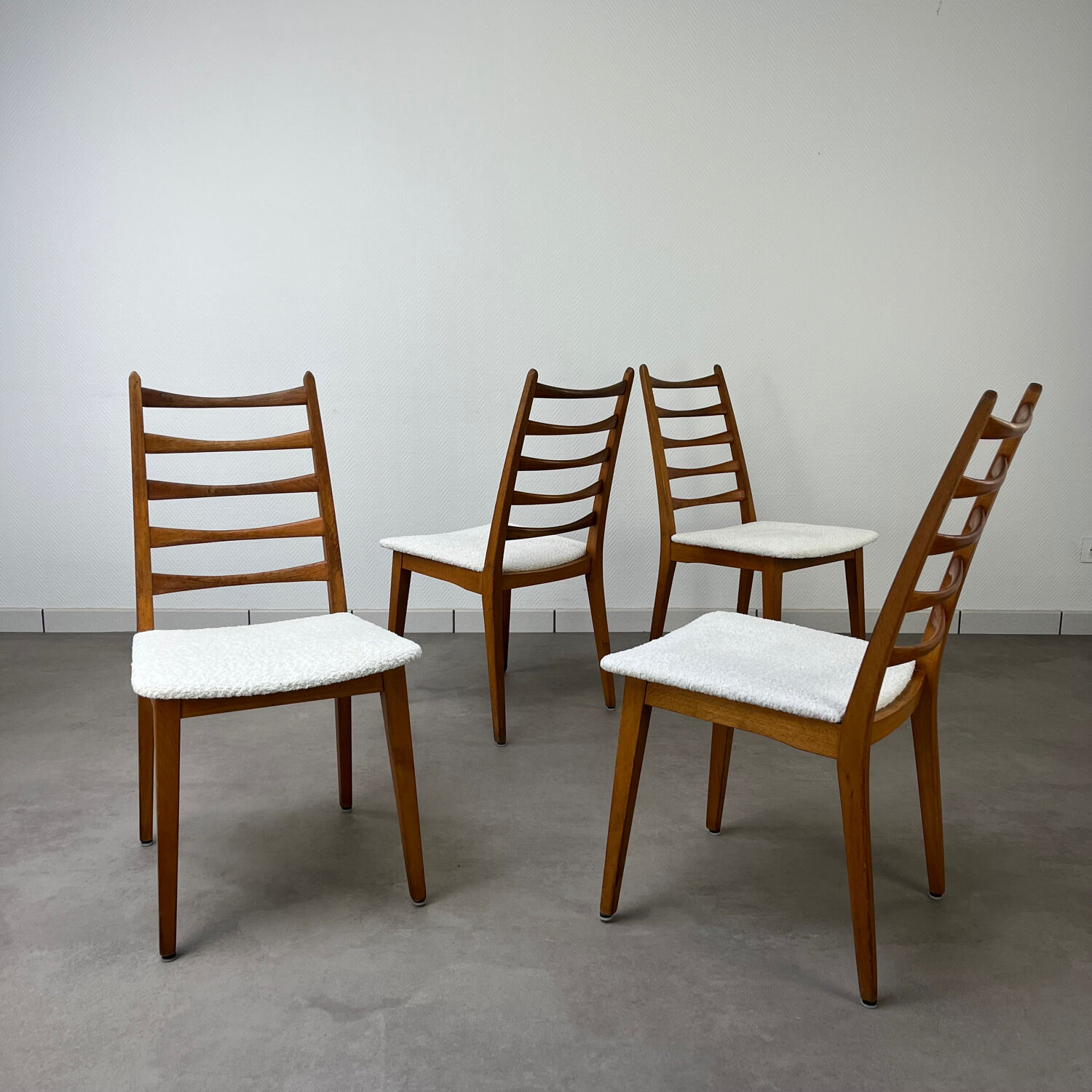 4 Scandinavian chairs, teak with boucle seats.