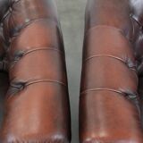 Set of three classic English-style Chesterfield cowhide  club armchairs