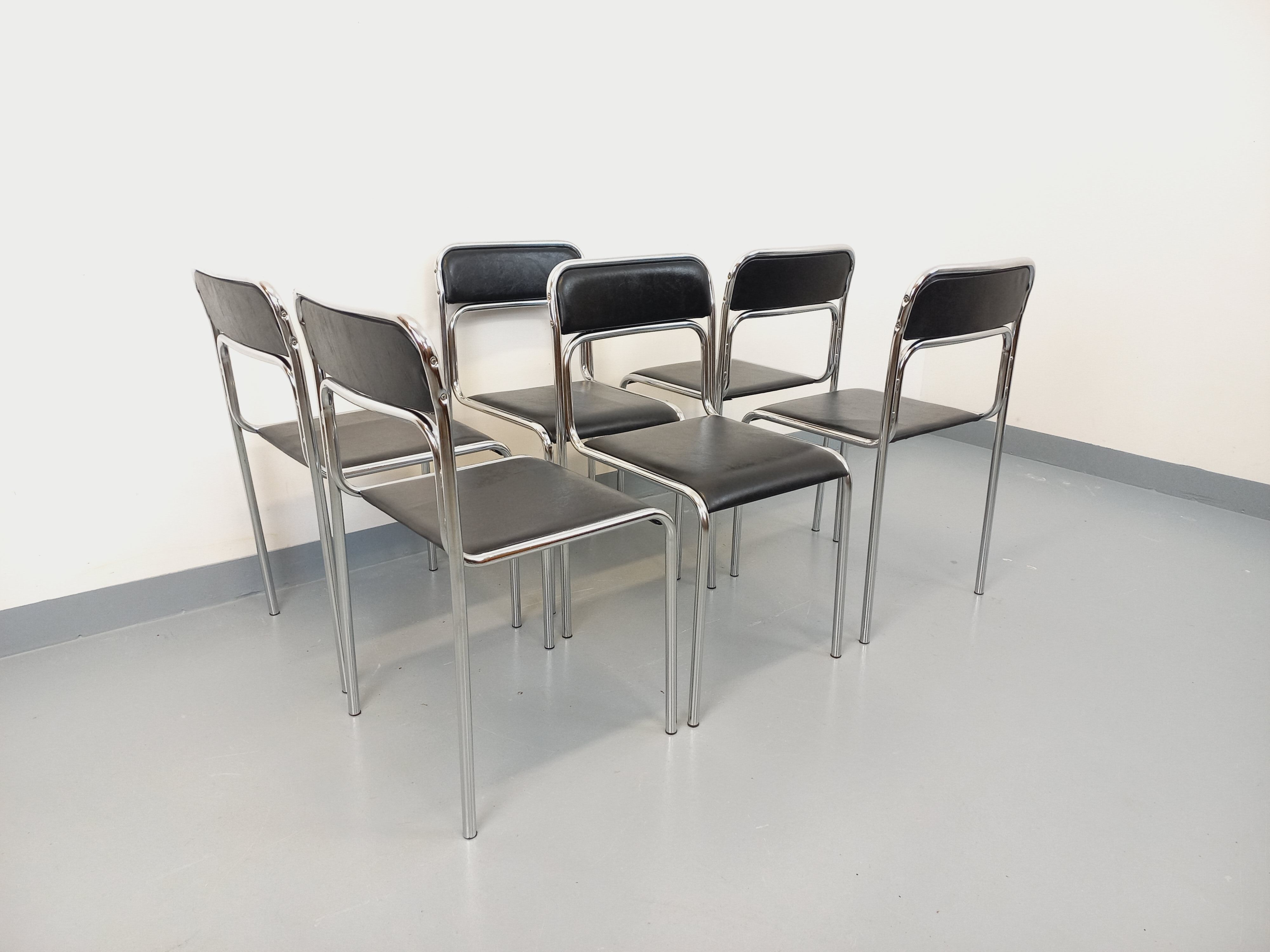 Set of 6 vintage Italian stackable chairs in chrome metal and skai.