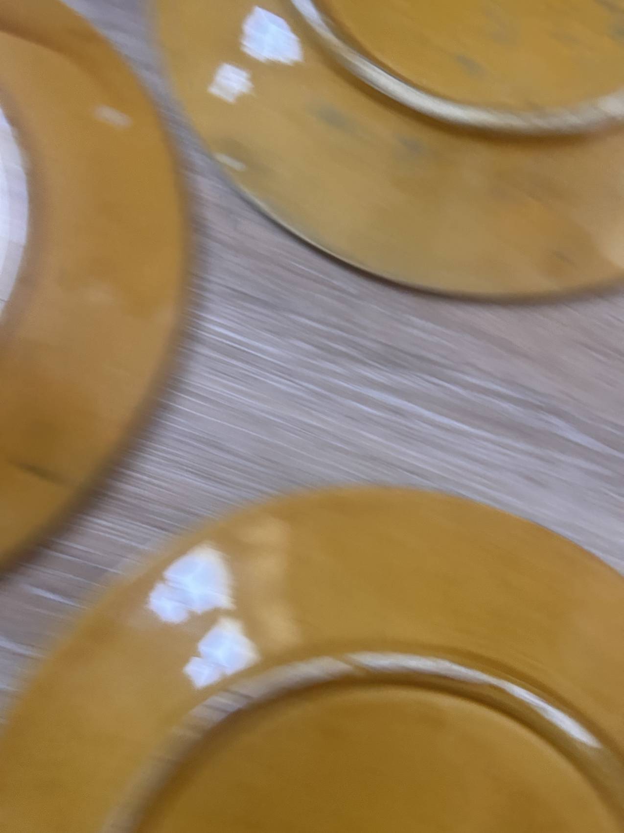 Four antique dessert plates in majolica with vine decoration.