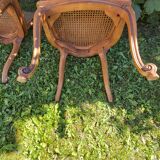 Set of three regency cane chairs