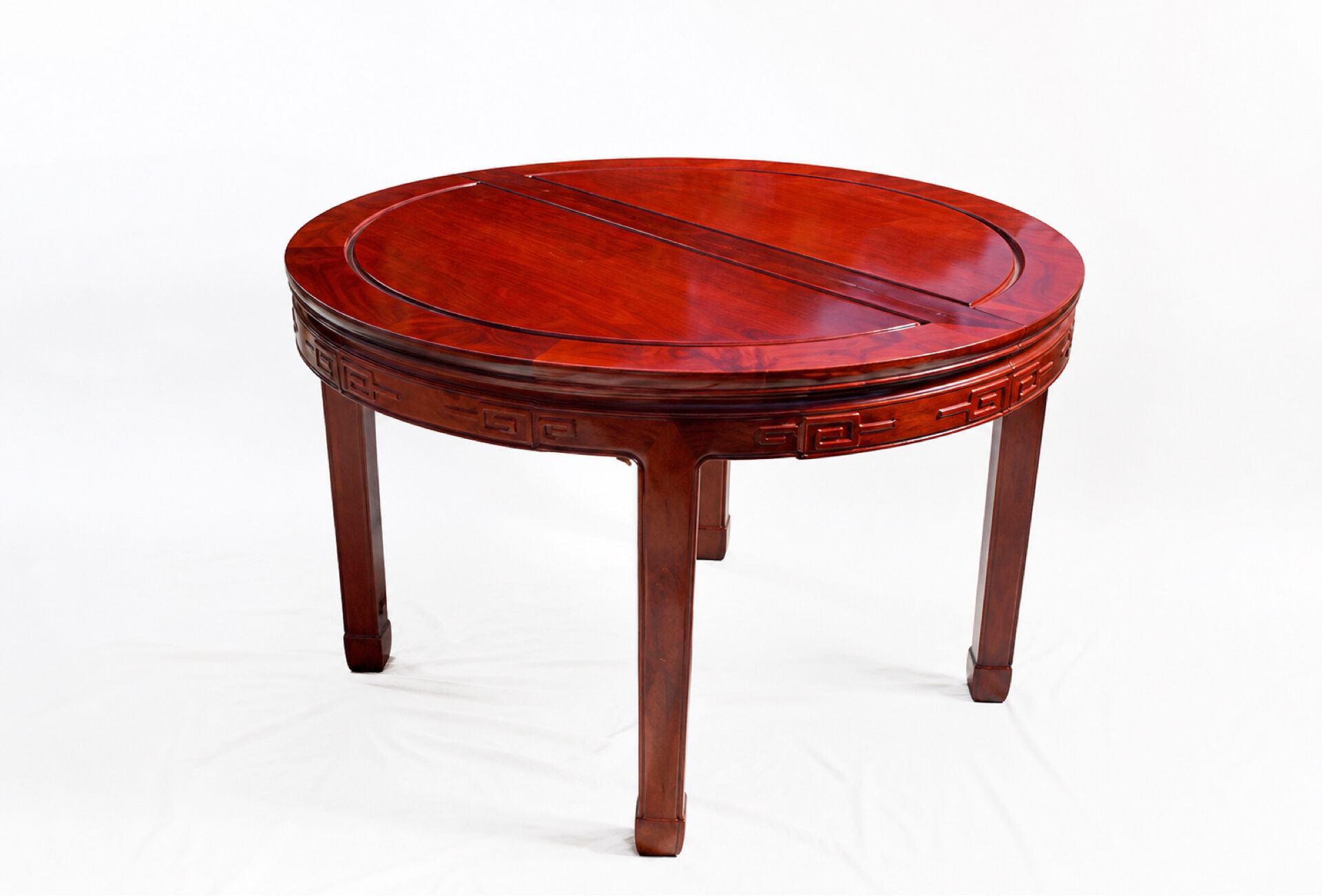 Extendable Chinese dining table in rosewood, 1970s.