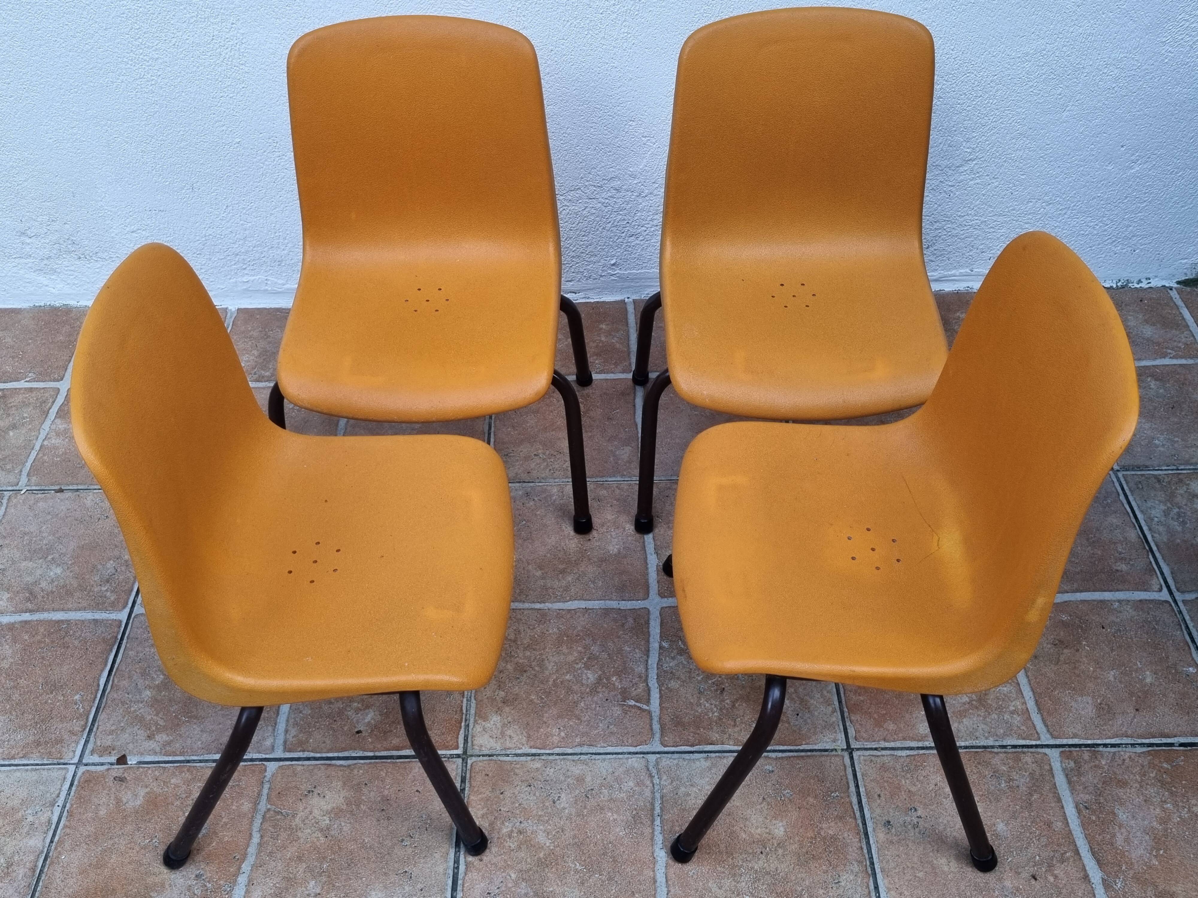 Set of 4 vintage Grosfillex school chairs, 60s-70s, orange plastic and tubular base