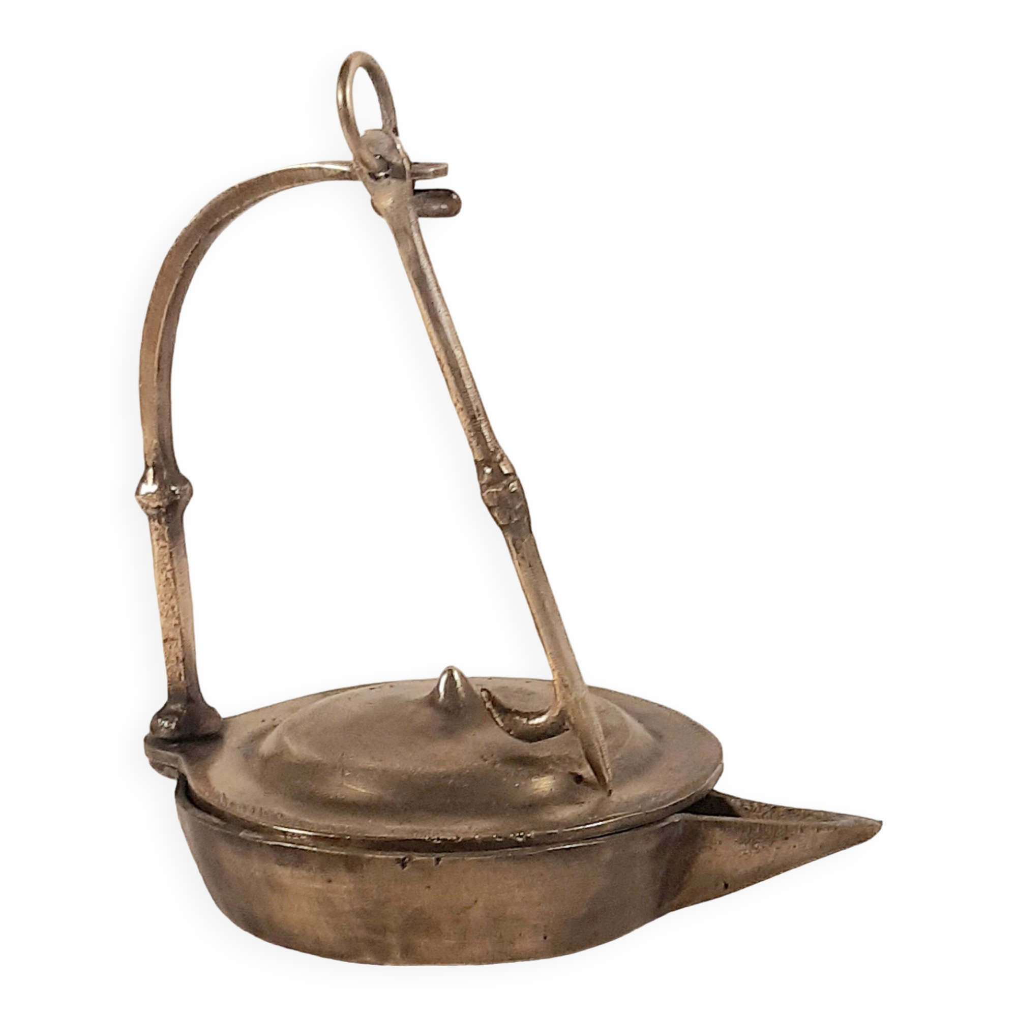 Old oil lamp in golden brass to hang