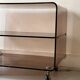 Smoked plexiglass TV/HiFi unit by M. Dumas for Roche Bobois, 1970