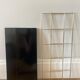 Black and gold string shelf