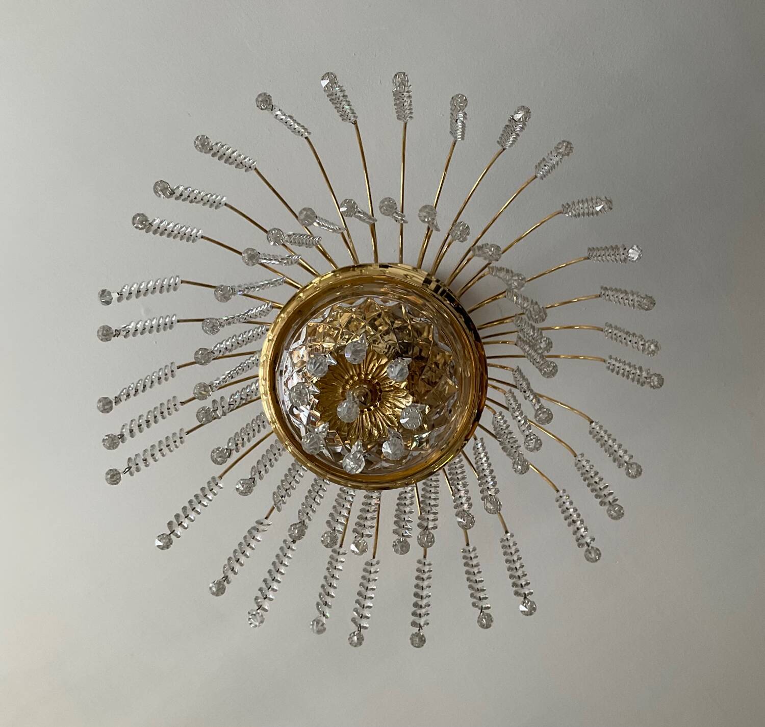 Brass waterfall chandelier with crystal tassels